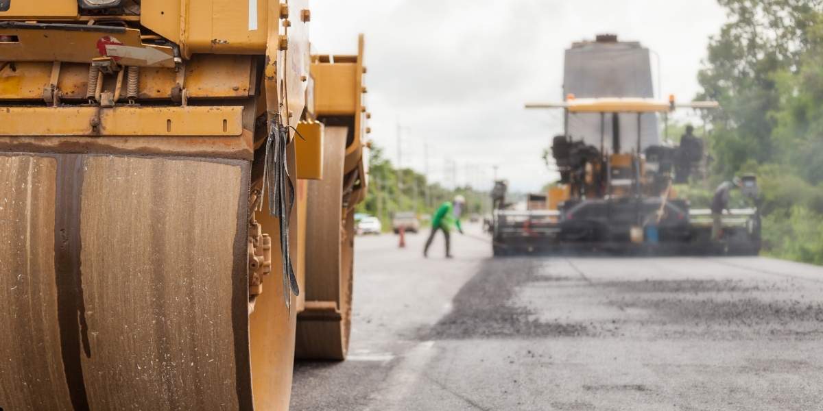 heavy machinery working on a road construction project in Pakistan