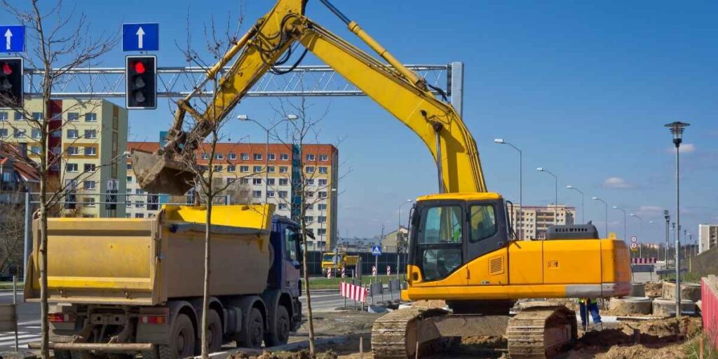 heavy machinery being used for infrastructure development and highway construction