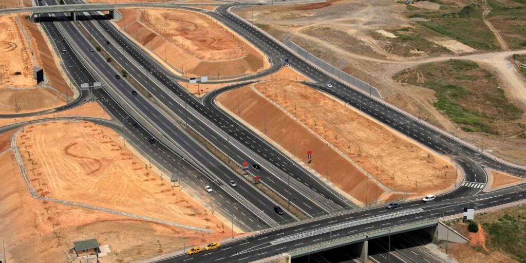 Modern road infrastructure development project in Pakistan with asphalt paving equipment